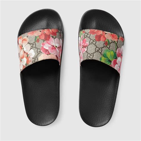 gucci bloom slides blue|Gucci flip flops with flowers.